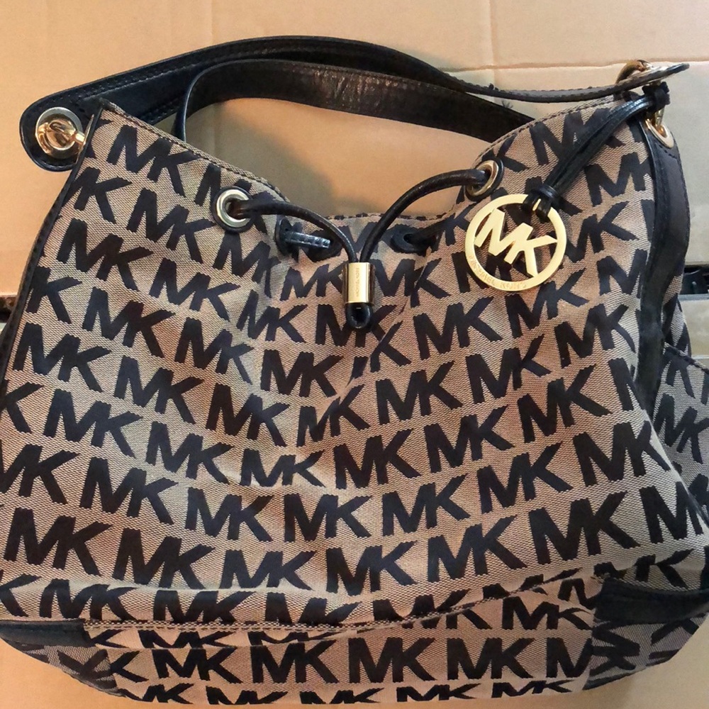 Black and grey Michael Kors Hobo bag